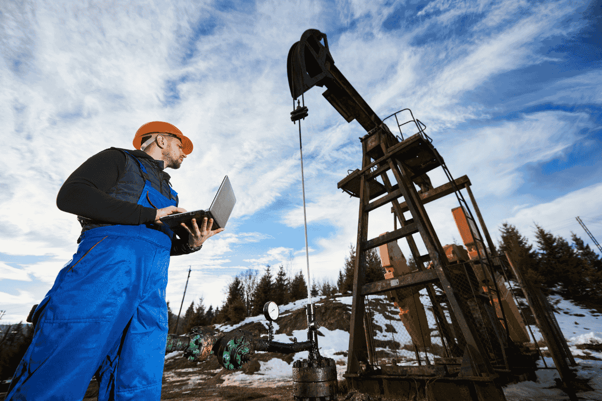 A site investigation worker about to start CBR testing at a construction site.